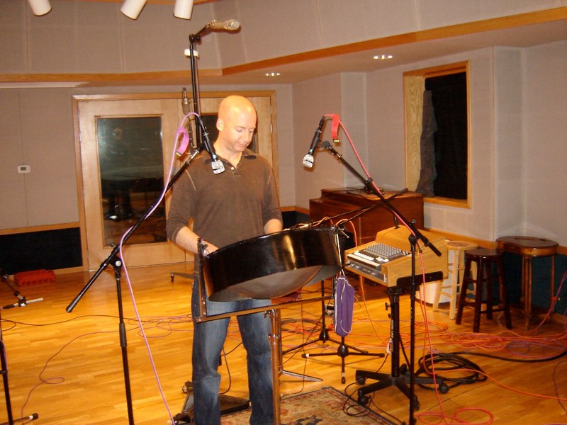 Yascha recording steel drum tracks at a studio in Portland, OR.